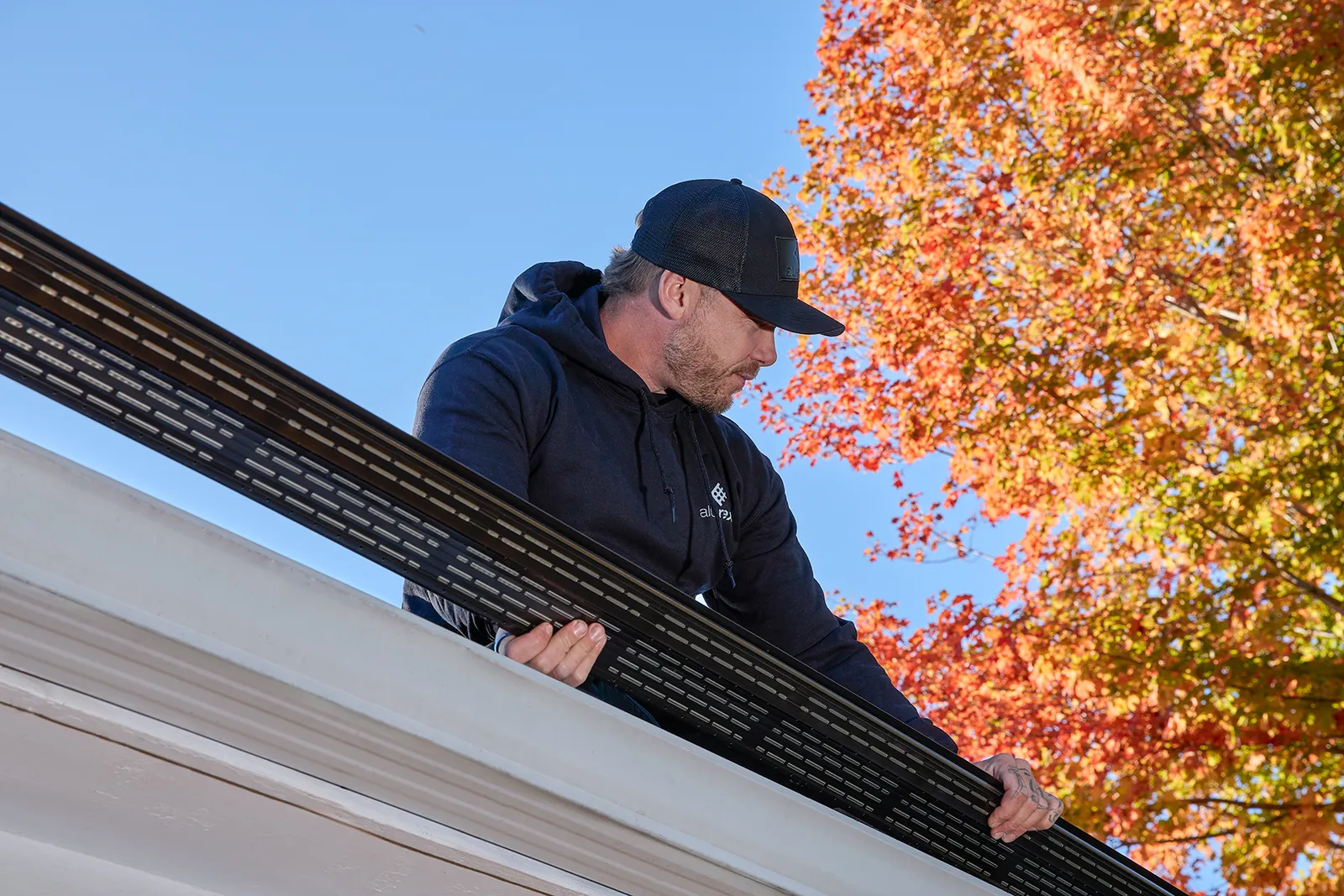 Seamless gutter with Alu-Rex protection, formed on site — Dunrite Eavestroughing, Edmonton AB